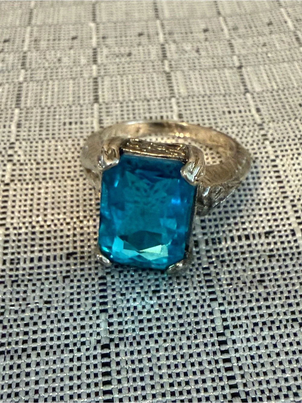 Silver Tone Ring with Vibrant Blue Emerald-Cut Stone